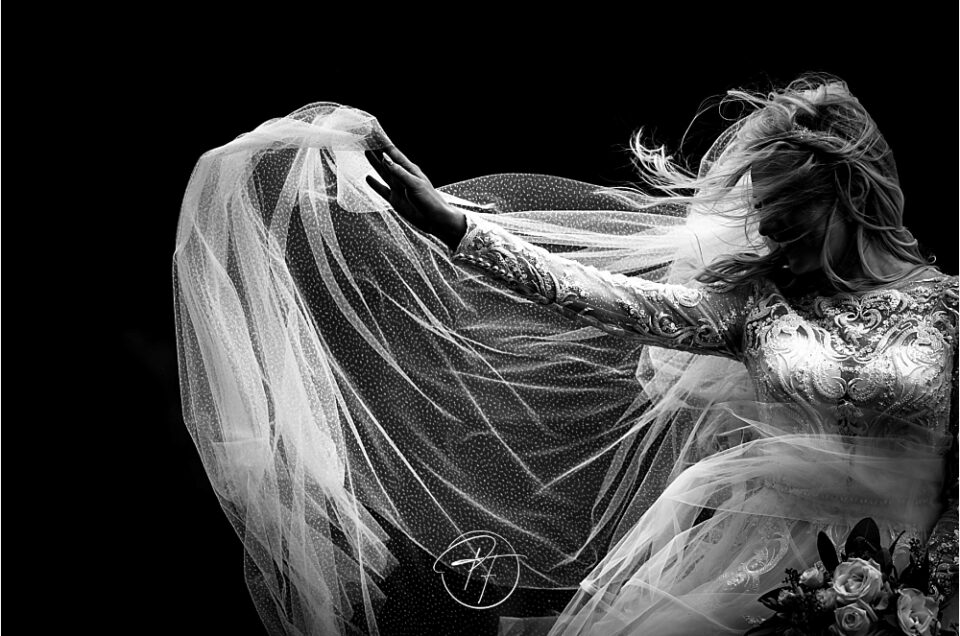 Bride in wind with veil