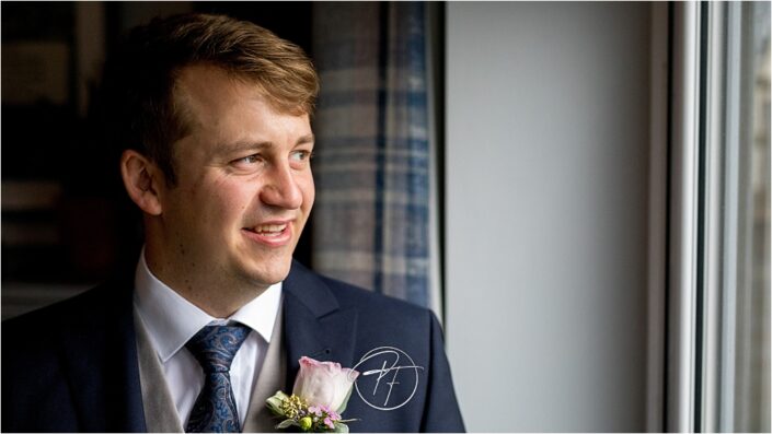 Groom getting ready for wedding ceremony